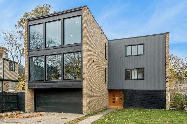 contemporary house with a front lawn