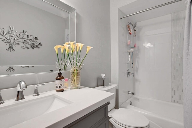 full bathroom featuring vanity, toilet, and bathtub / shower combination