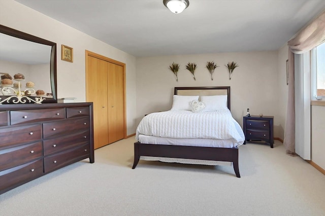 bedroom with light colored carpet