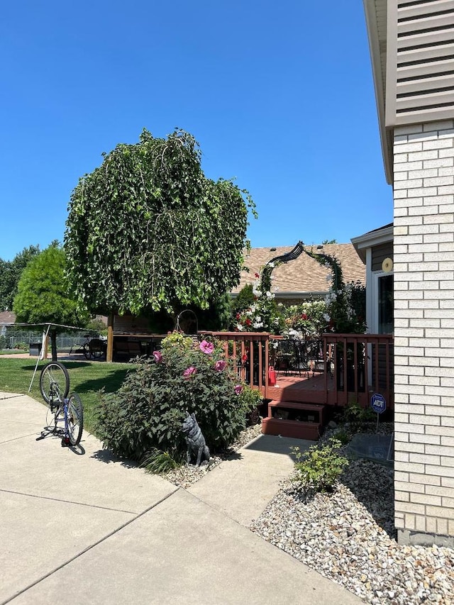 exterior space featuring a wooden deck