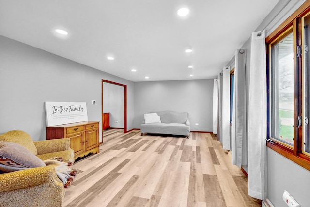 sitting room with light hardwood / wood-style floors