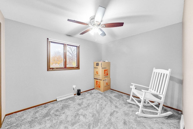 sitting room featuring ceiling fan and light colored carpet