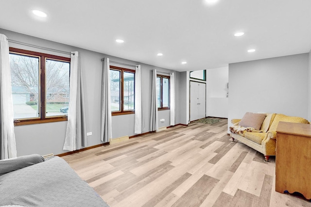 sitting room with light hardwood / wood-style floors