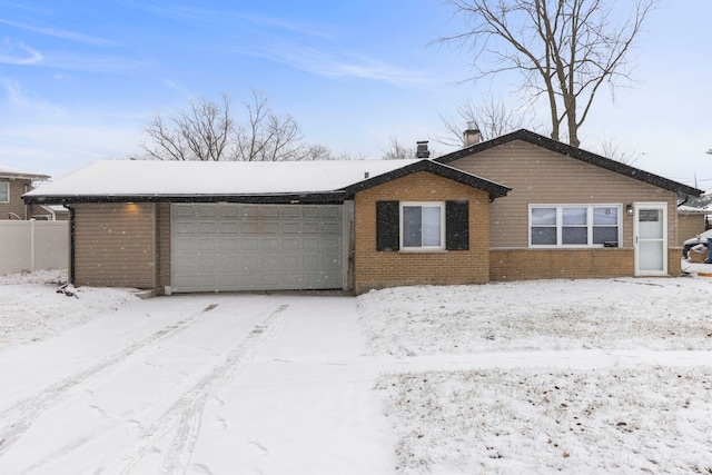 single story home featuring a garage