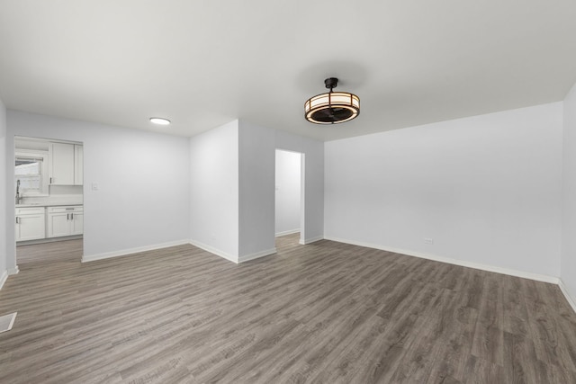 unfurnished living room with light hardwood / wood-style flooring