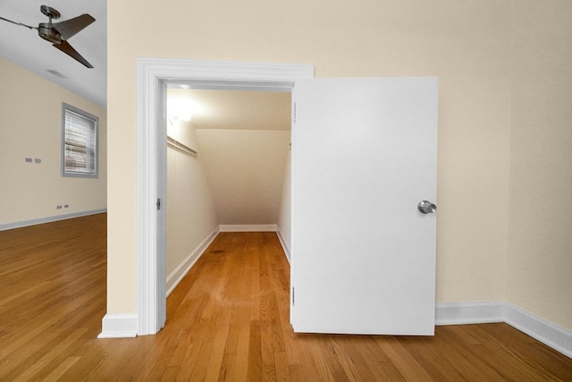 hall with light hardwood / wood-style floors