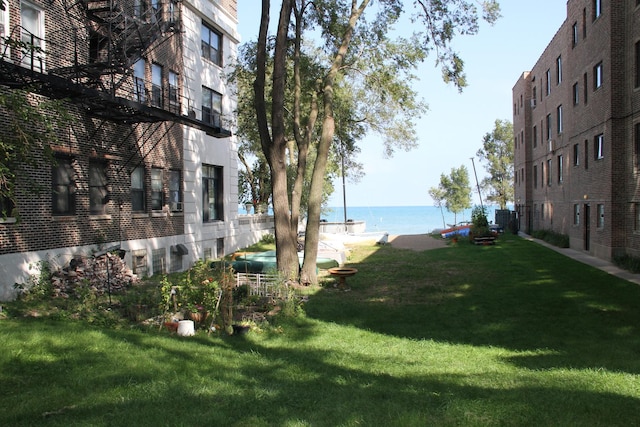 view of yard with a water view