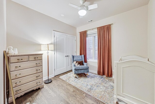 bedroom featuring ceiling fan and light hardwood / wood-style flooring