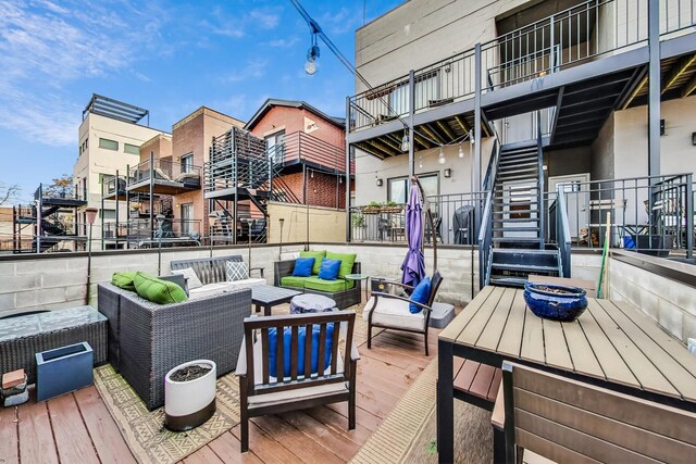 wooden deck featuring an outdoor living space