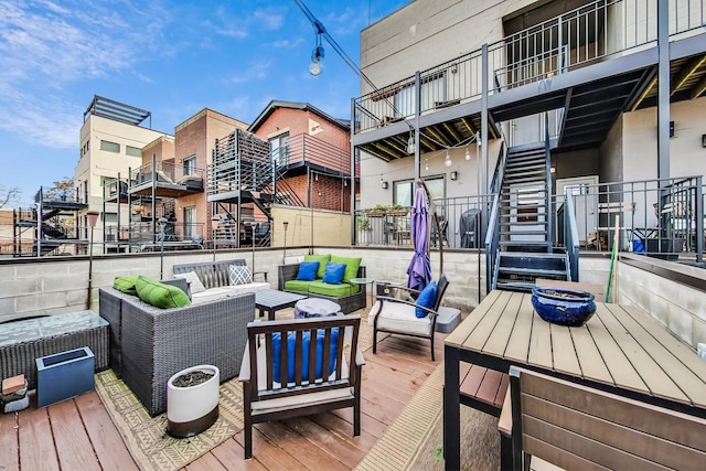 wooden deck featuring an outdoor living space