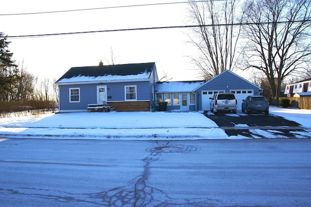 view of front of property with a garage