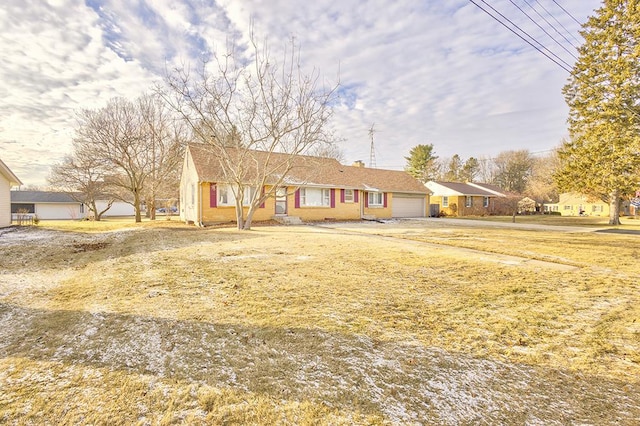 single story home featuring a garage