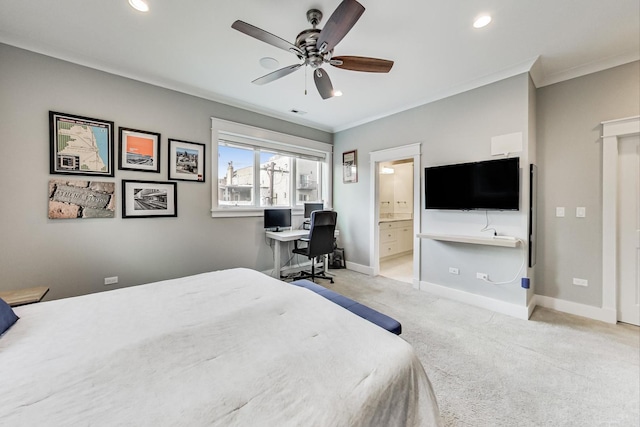 bedroom featuring ensuite bathroom, ceiling fan, crown molding, and light colored carpet