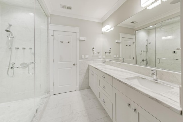 bathroom with tile walls, an enclosed shower, ornamental molding, and vanity