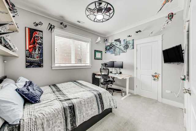 bedroom with light colored carpet and crown molding