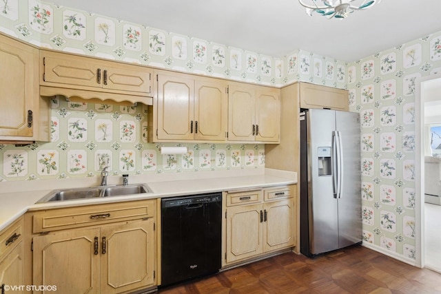 kitchen featuring dark parquet floors, sink, stainless steel fridge, black dishwasher, and light brown cabinetry