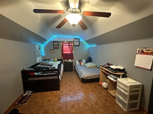 bedroom featuring lofted ceiling and ceiling fan