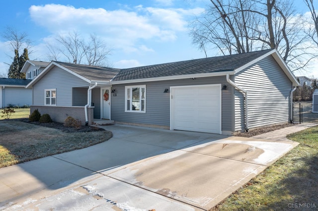 single story home featuring a garage