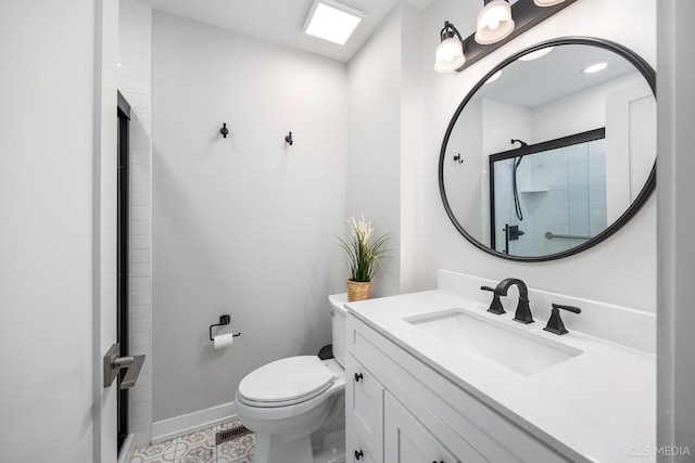 bathroom featuring vanity, toilet, and walk in shower