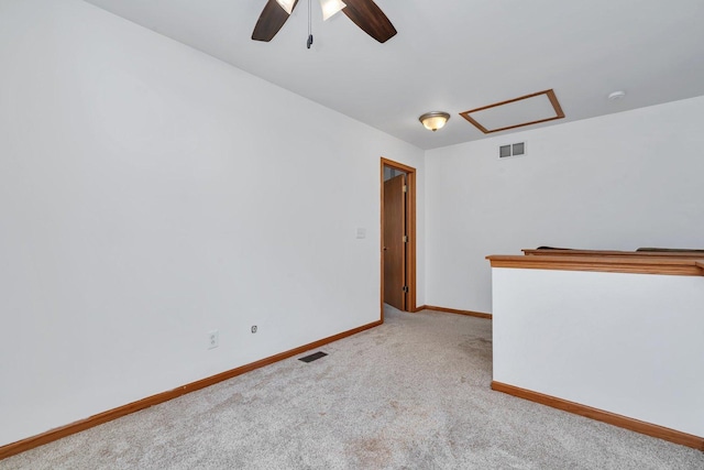 carpeted empty room with ceiling fan