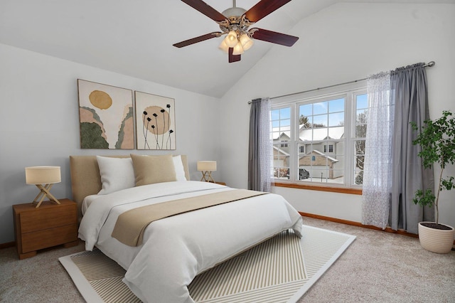 bedroom with ceiling fan, light carpet, and lofted ceiling