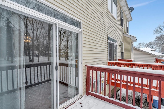 view of snow covered deck