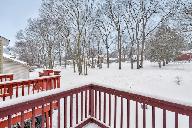 view of snow covered deck