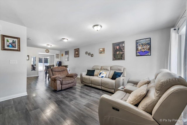 living room featuring dark hardwood / wood-style flooring