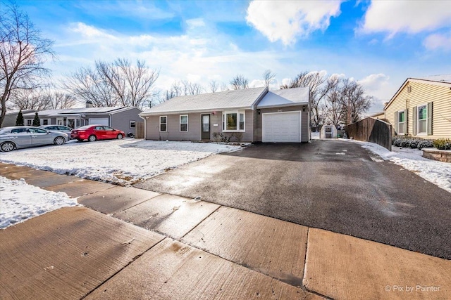 ranch-style home with a garage