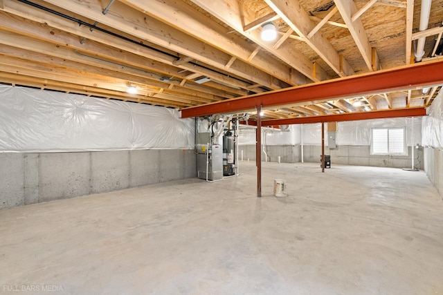 basement featuring gas water heater