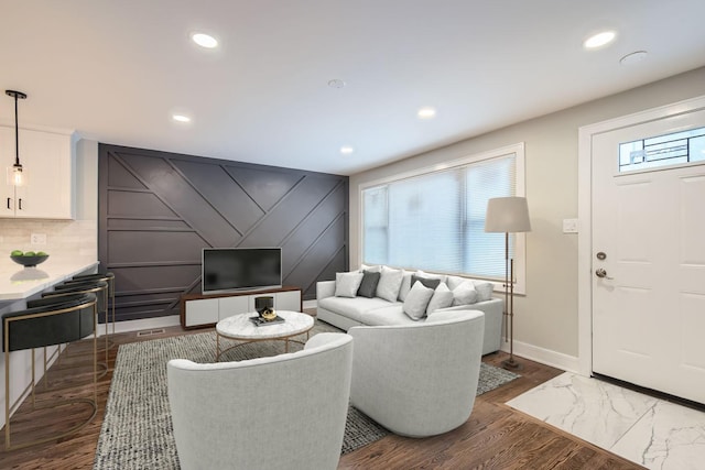 living room featuring dark wood-type flooring