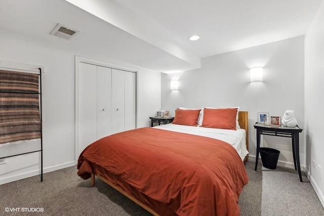 carpeted bedroom featuring a closet