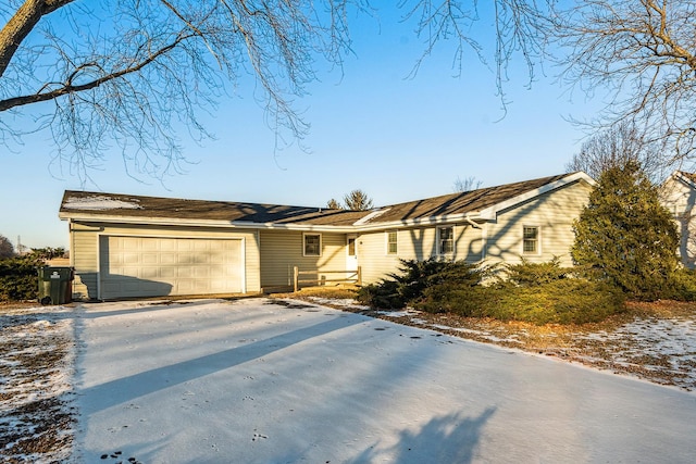 ranch-style home with a garage