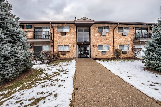 view of snow covered property