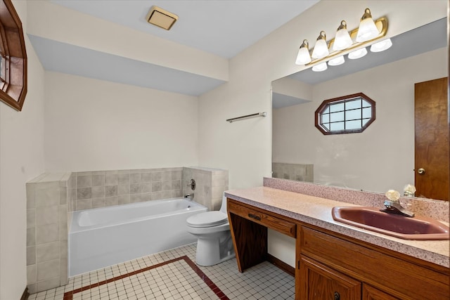 bathroom featuring a washtub, toilet, vanity, and tile patterned flooring