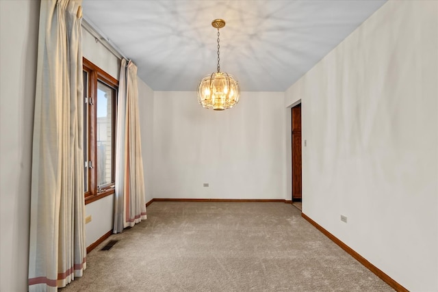 unfurnished room with light colored carpet and an inviting chandelier