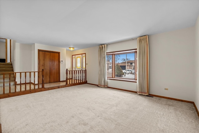 empty room featuring carpet flooring