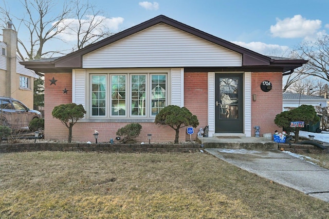 bungalow with a front lawn