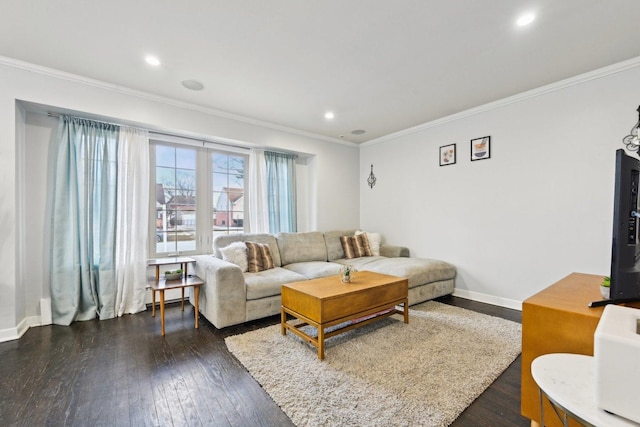 living room featuring dark hardwood / wood-style flooring and crown molding