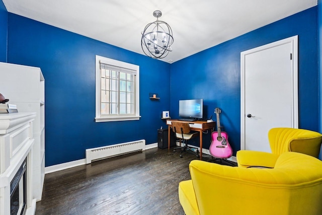 office space with dark wood-type flooring, a baseboard radiator, and an inviting chandelier