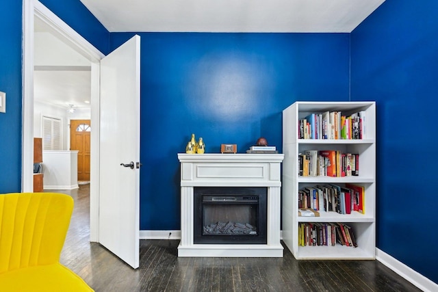 unfurnished room with dark hardwood / wood-style floors