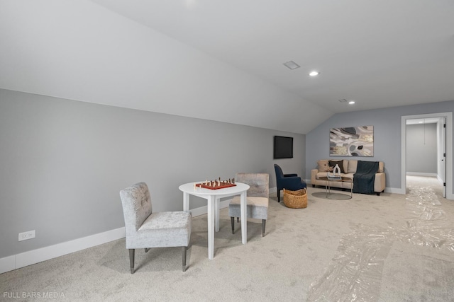 recreation room with lofted ceiling