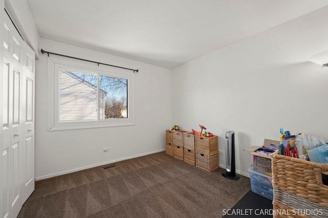 bedroom featuring dark colored carpet