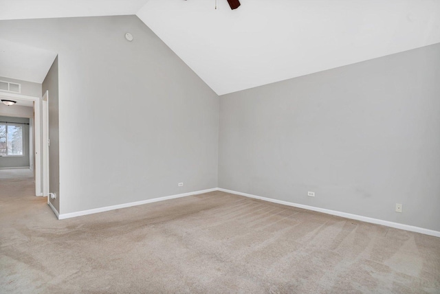 additional living space featuring light carpet, vaulted ceiling, and ceiling fan