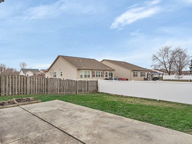 exterior space with a yard and a patio