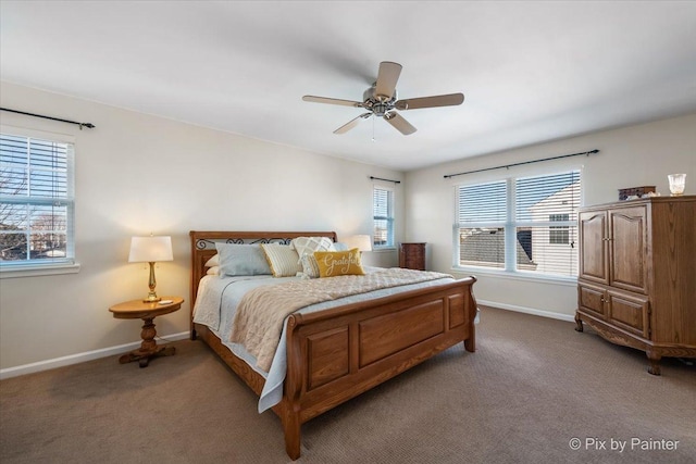 bedroom featuring multiple windows, carpet floors, and ceiling fan