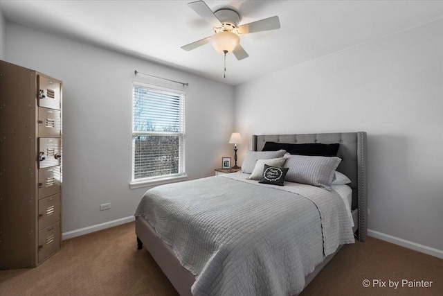 bedroom with ceiling fan and carpet