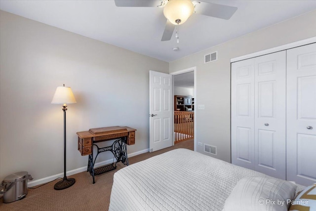 carpeted bedroom featuring a closet and ceiling fan