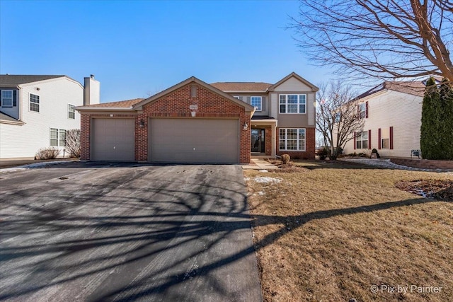 view of front property with a garage