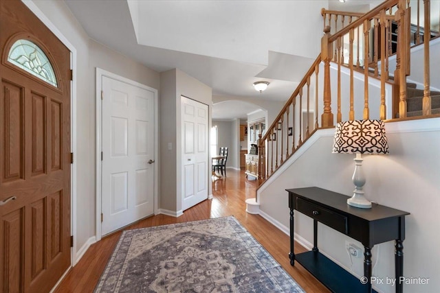 foyer entrance featuring wood-type flooring